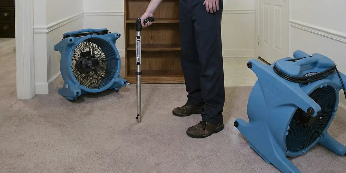 emergency water removal equipment deployed to dry a flooded residential interior in Erie, PA